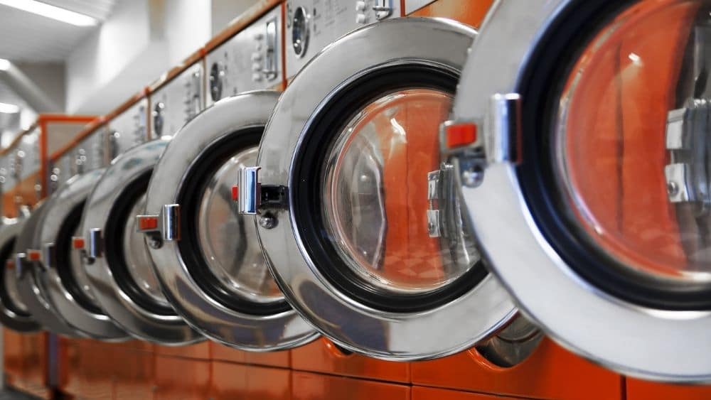 a row of laundromat washers.