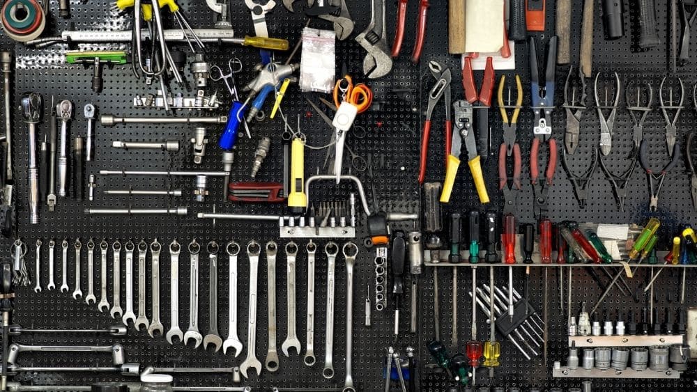 pegboard wall of organized tools.
