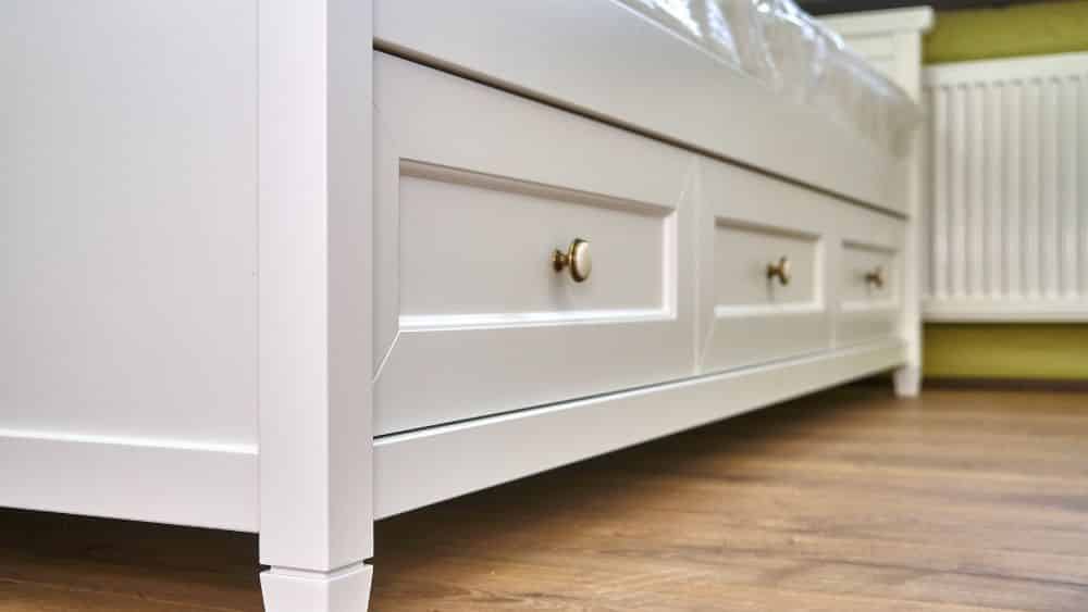 Drawers under a bed.