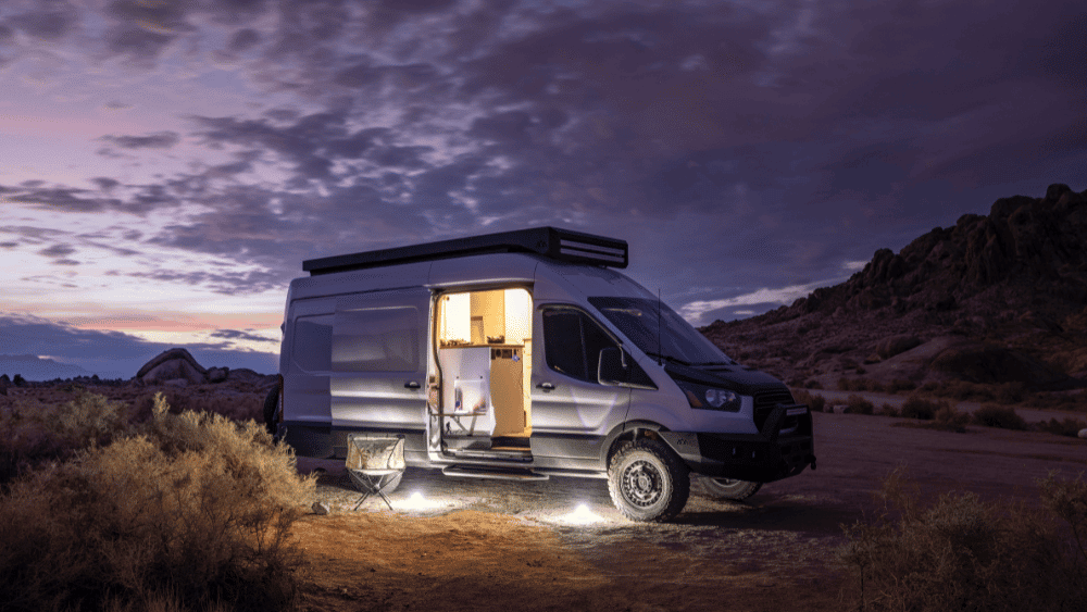 Nighttime view of a converted van.